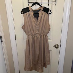 Women’s tan and black mid length sleeveless dress